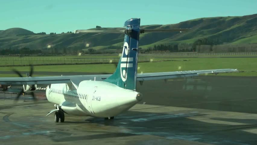 DUNEDIN, NEW ZEALAND - CIRCA MAY 2012: A Q300 Domestic flight taxiing to runway