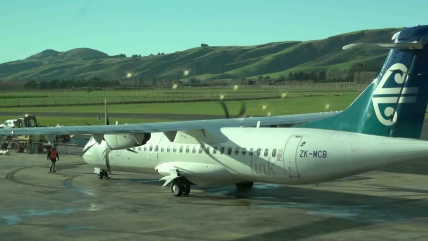DUNEDIN, NEW ZEALAND - CIRCA MAY 2012: A Q300 Domestic flight starting engines
