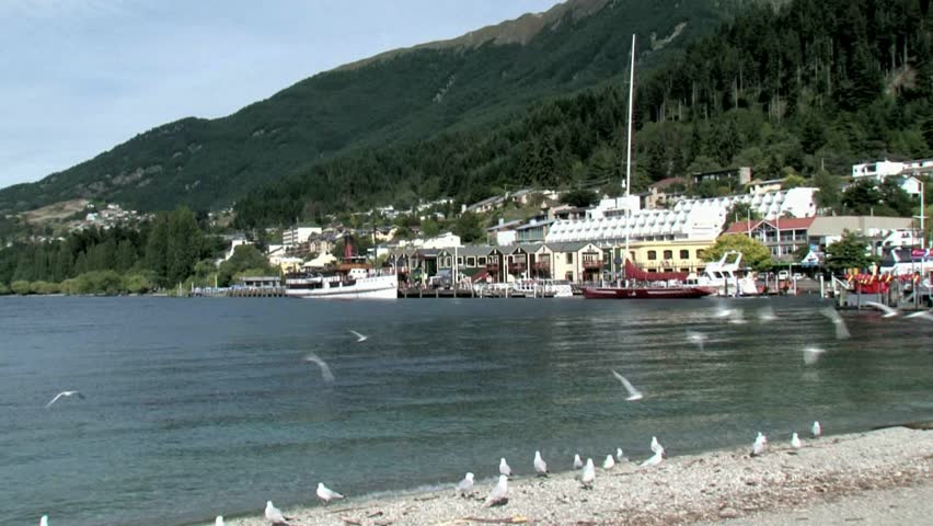 Queenstown, New Zealand - January 2012. View across Lake Wakatipu to the commercial tourist wharf
