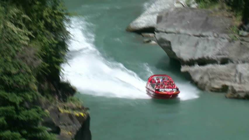 QUEENSTOWN, NEW ZEALAND - CIRCA OCTOBER 2012: Jet boat traveling down the