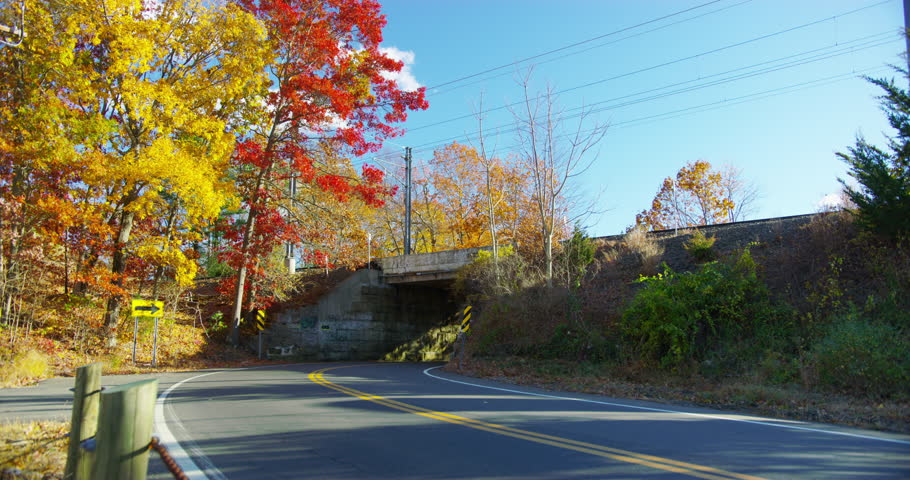 Classic New England road during fall time in Branford, Connecticut.