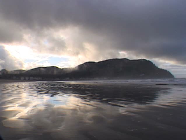 Clouds move fast over Pacific Ocean in Seaside Oregon, Time lapse.