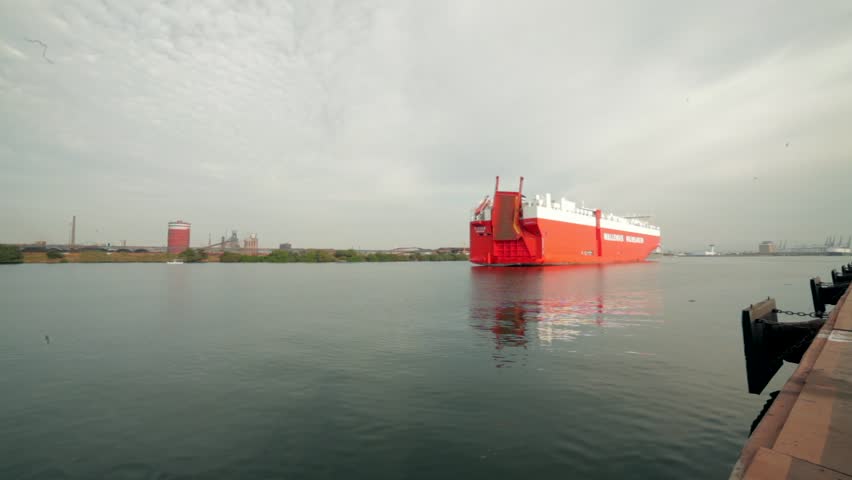 Mexico, Michoacán City, Lazaro Cardenas – 27 February 2016: : A time lapse of a cargo ship arriving