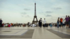 People approaching the Eiffel Tower, Trocadero. Blurred