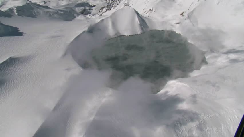 a scenic flight over the Togariro the oldest national park in New Zealand which encircles the volcanoes of Tongariro, Ngauruhoe and Ruapehu. 