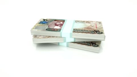 Piles of Bahrain money isolated on white background with alpha mask included