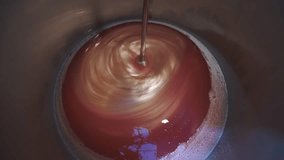 Inside the industrial mixer are mixing liquids of different colors (5 Shots in 1 clip) 