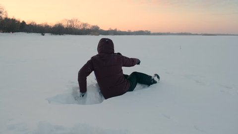 Man has an accident on a snow