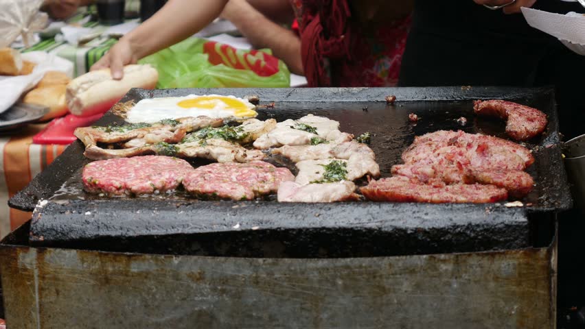 Choripan, a Street food being prepared in La Boca disctrict of Buenos Aires in Argentina