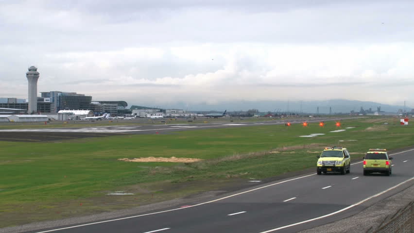 PORTLAND CIRCA 2010: Airplane takes off at Portland Oregon airport with two
