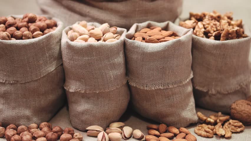 Sacks Different Types Nuts Almond Pistachios: стоковое видео (без лицензион...