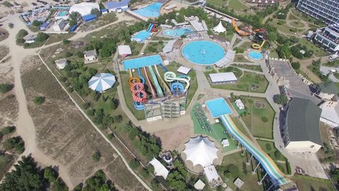 Aerial video of the hotel Aquamarine, aquapark Zurbagan, the beach in Victory Park in the summer and fall.