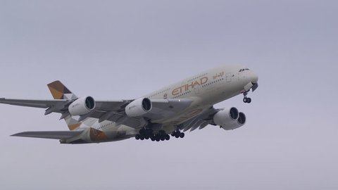 OSLO AIRPORT NORWAY - FEBRUARY 1, 2017: Etihad Airbus A380 world largest passenger airplane takeoff from runway front side view
