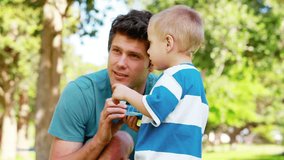 Boy explaining how he broke his toy in a park - Powered by Shutterstock - Get 15% off with code: PIKWIZARD15