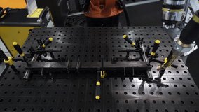Industrial robot hand in welding spot process