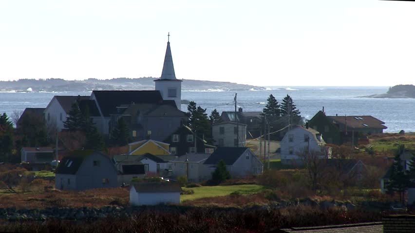 The fishing village of Prospect Bay, Nova Scotia.  An early November morning with a rough sea in the background.  There is still some color in the vegetation as it