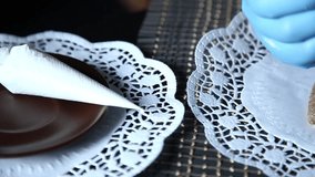 Female hands decorating gingerbread stocking with icing sugar using selfmade pastry bag - Powered by Shutterstock - Get 15% off with code: PIKWIZARD15