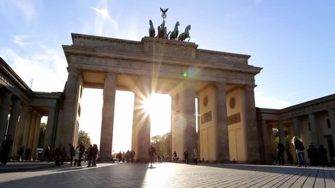 BERLIN, GERMANY - April 22, 2016: People walking past the Brandenburg Gate in Berlin.