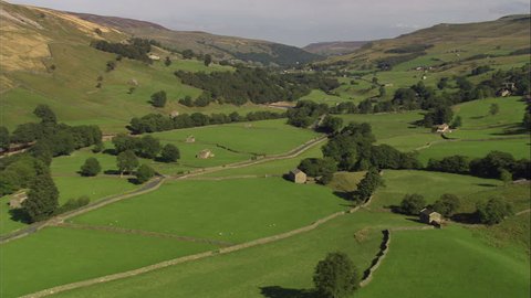 Track Down Swaledale Over Stone Walls And Barns
