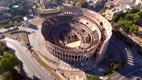 Aerial Colosseum flying near structure also known as Coliseum or Flavian Amphitheatre or Colosseo oval amphitheatre centre Rome Italy largest amphitheatre popular tourist attraction in Italy Europe 4k
