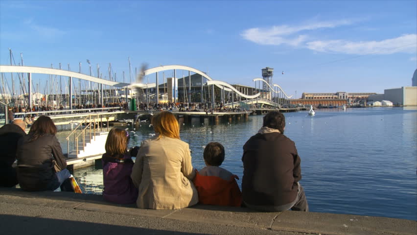 people and sea gulls at Marina Pier /mare magnum, Barcelona