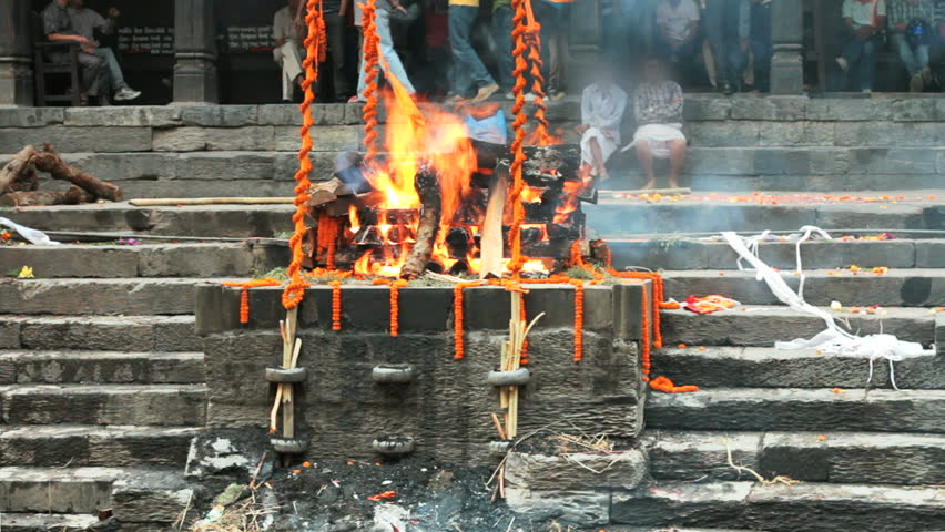  a traditional Hindu cremation ceremony  in Pashupatinath, Nepal. 