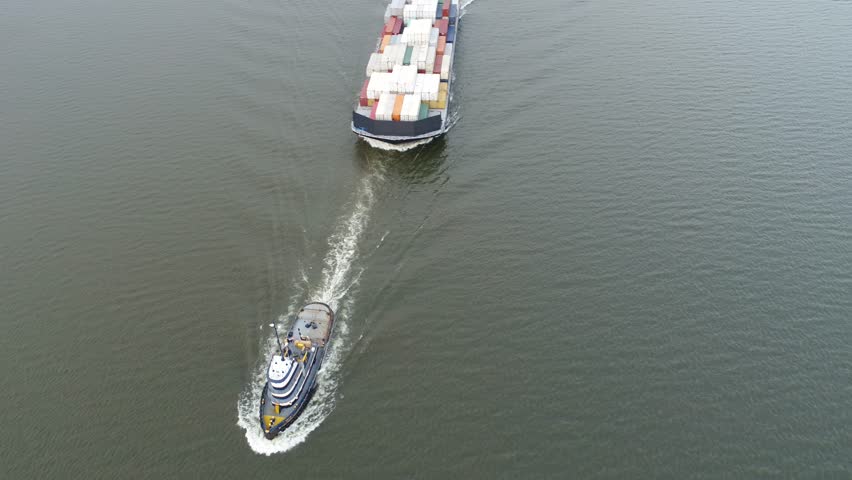 Aerial Footage of Tugboat Pulling Barge on Delaware River Philadelphia PA