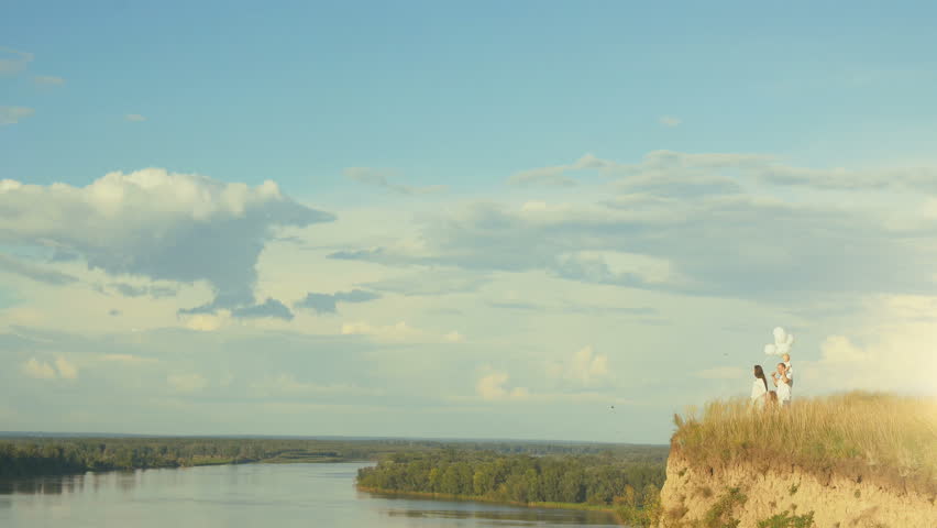 Family resting in nature.