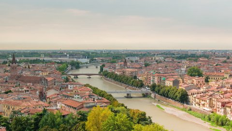 Amazing time lapse video with panoramic landscape of Verona city and bridges over Adige river, Italy. Zooming in motion.