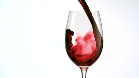 Red wine poured into glass shooting with high speed camera, phantom flex.