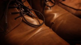 Close up Camera move by old fasioned captoe dress shoes
