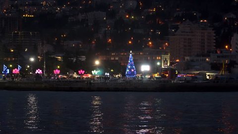 Yalta, Crimea - December 23, 2016: Christmas tree on the waterfront at night.