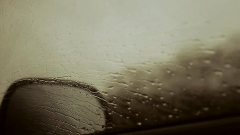Rainy weather. The car rides in rainy weather.
