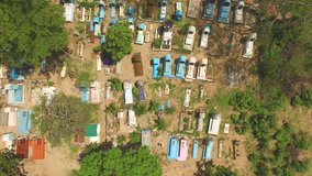 Small mexican cemetery with colorful coffins. Vertical aerial drone video.
About tradition, south america, mourning, sadness, culture