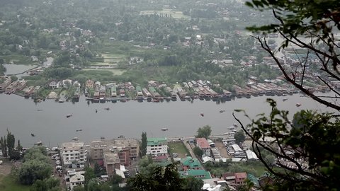  Srinagar in India lies on the banks of the Jhelum River, a tributary of the Indus, and Dal lake, famous for its gardens, waterfronts and houseboats/ View of Srinagar and Dal Lake/ Jammu and Kashmir