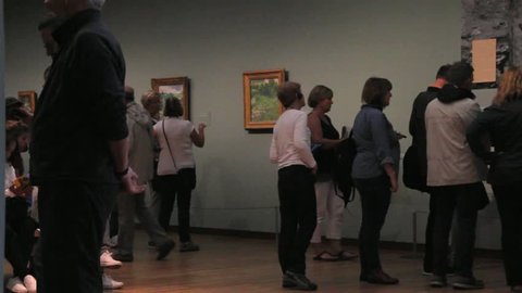 Amsterdam/netherlands - Aug 10 2016: Visitors at One of the Halls of Van Gogh Museum