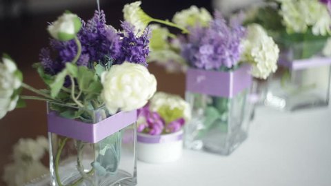 tableware and decor of bouquets of flowers for the wedding party