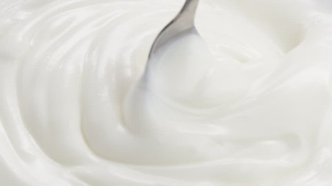 Slow motion of mixing yogurt with spoon, 180fps prores footage