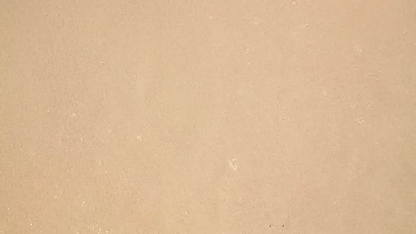 Handwritten on beach, year, number | Shutterstock HD Video #23761384