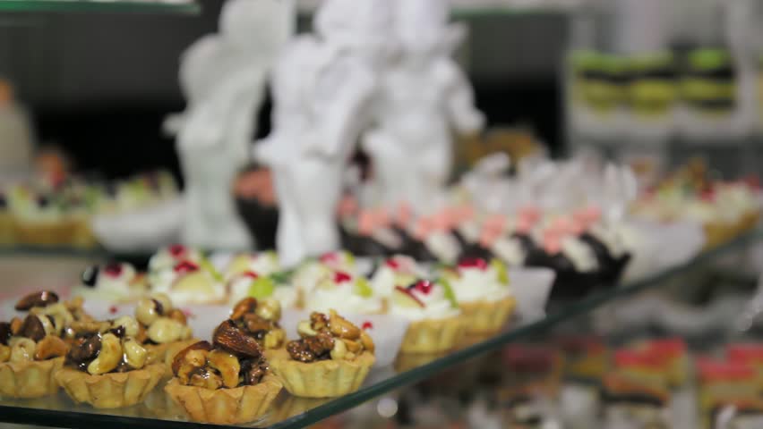  Small cakes. Sweet bakery. Wedding cakes on candy bar.Candy bar. Small cakes for candy bar.