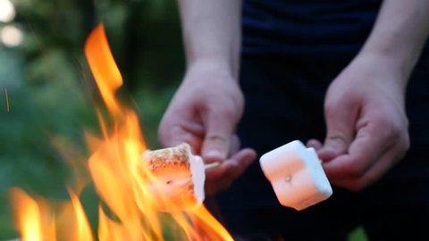Roasted marshmallow by campfire
