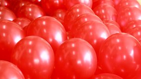 Red balloon fall down, prepare balloon for the party decoration footage