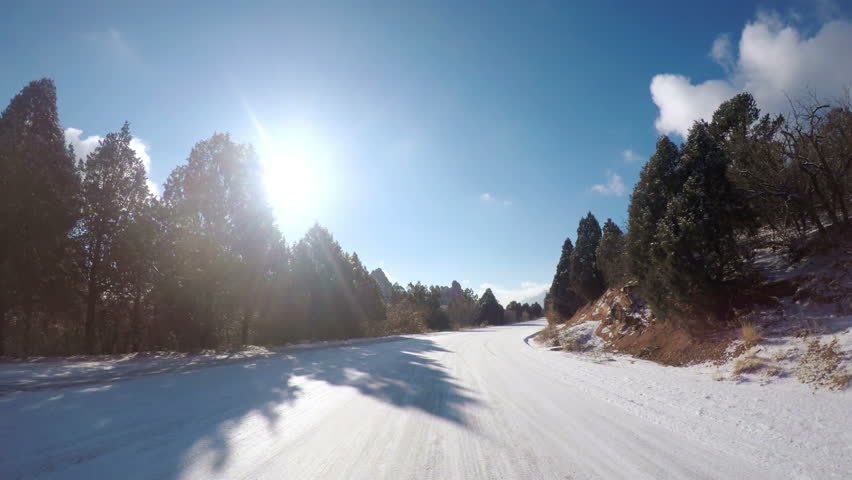 POV point of view - Driving through Garden of the Gods on late morning in the Winter.