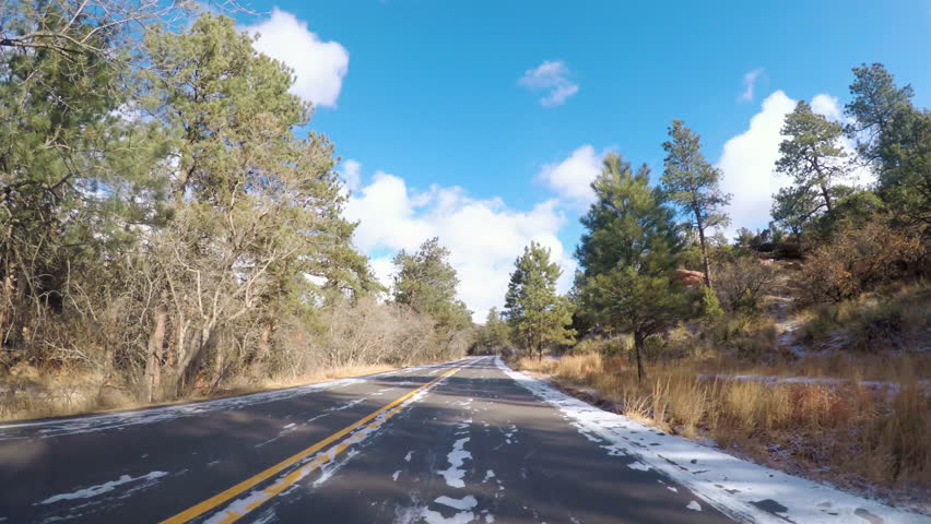 POV point of view - Driving through Garden of the Gods on late morning in the Winter.