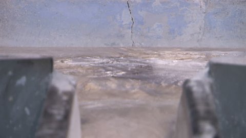 Molten metal flowing liquid aluminium casting at foundry 