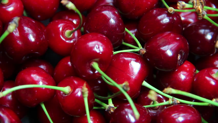 Fresh, ripe, juicy cherries rotate. Red cherry clockwise rotation