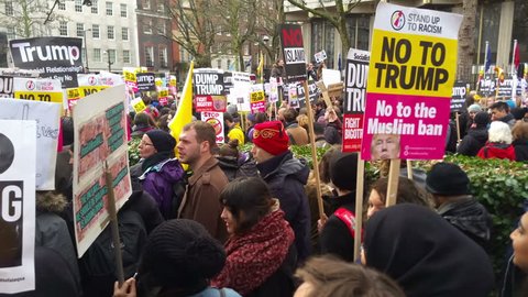 LONDON - FEBRUARY 04, 2017: Thousands of political protesters taking part in the NO MUSLIM BAN demonstration against president Donald Trump's ban on people from 7 Muslim countries entering the USA.