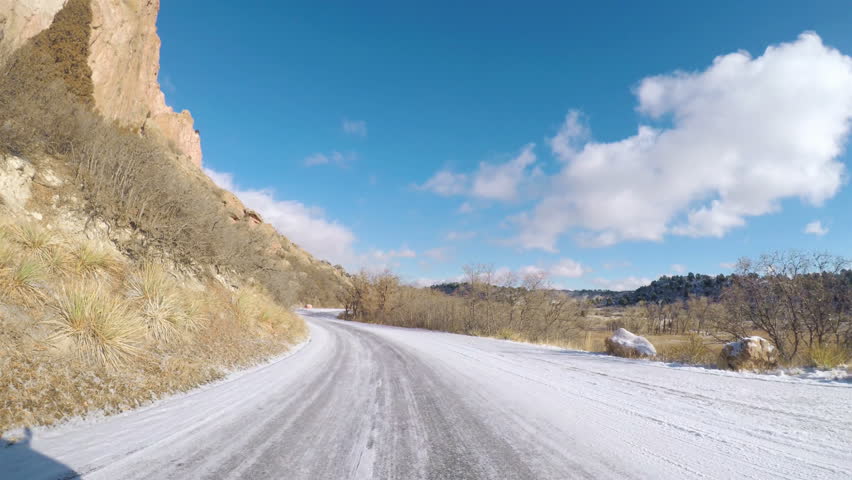POV point of view - Driving through Garden of the Gods on late morning in the Winter.