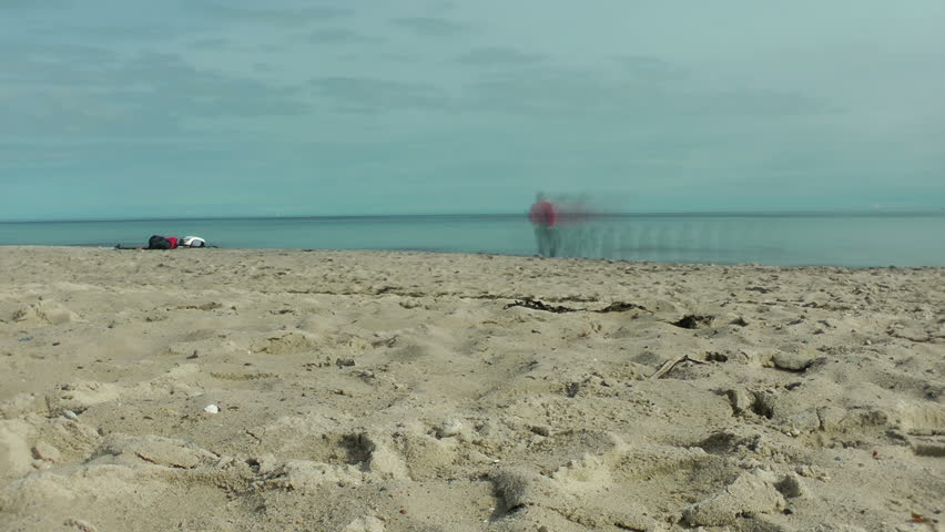 Happy family on the beach, ghosting, time lapse