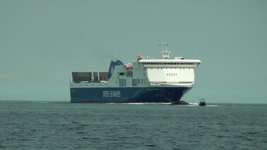 LABOE, GERMANY - APRIL 9: DFDS Regina Seaways being guided by the Pilot on April